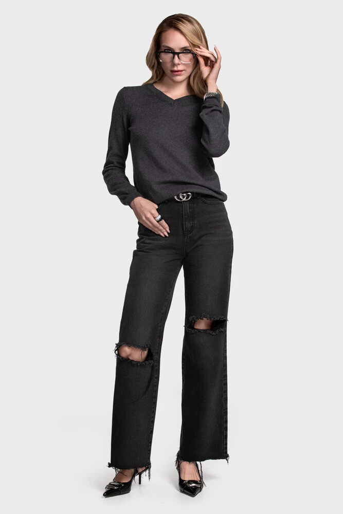 Charcoal v-neck sweater with black distressed wide-leg jeans and pointed heels